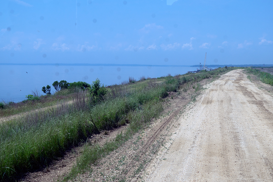 photo of a road atop a perimeter dike at Hart-Miller Island