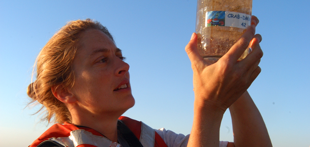 researcher with bottle