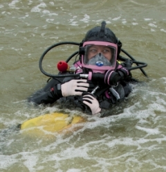 photo of Adriane Michaelis in water wearing scuba-diving gear