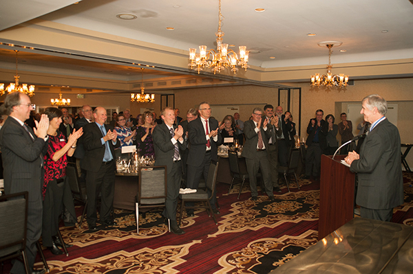 Audience applauds Walter Boynton