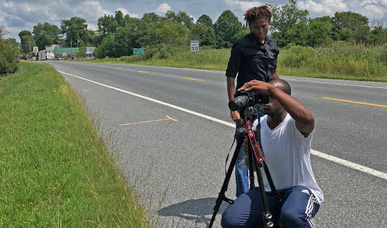 Wyman Jones and Jalysa Mayo setting up for a video shoot