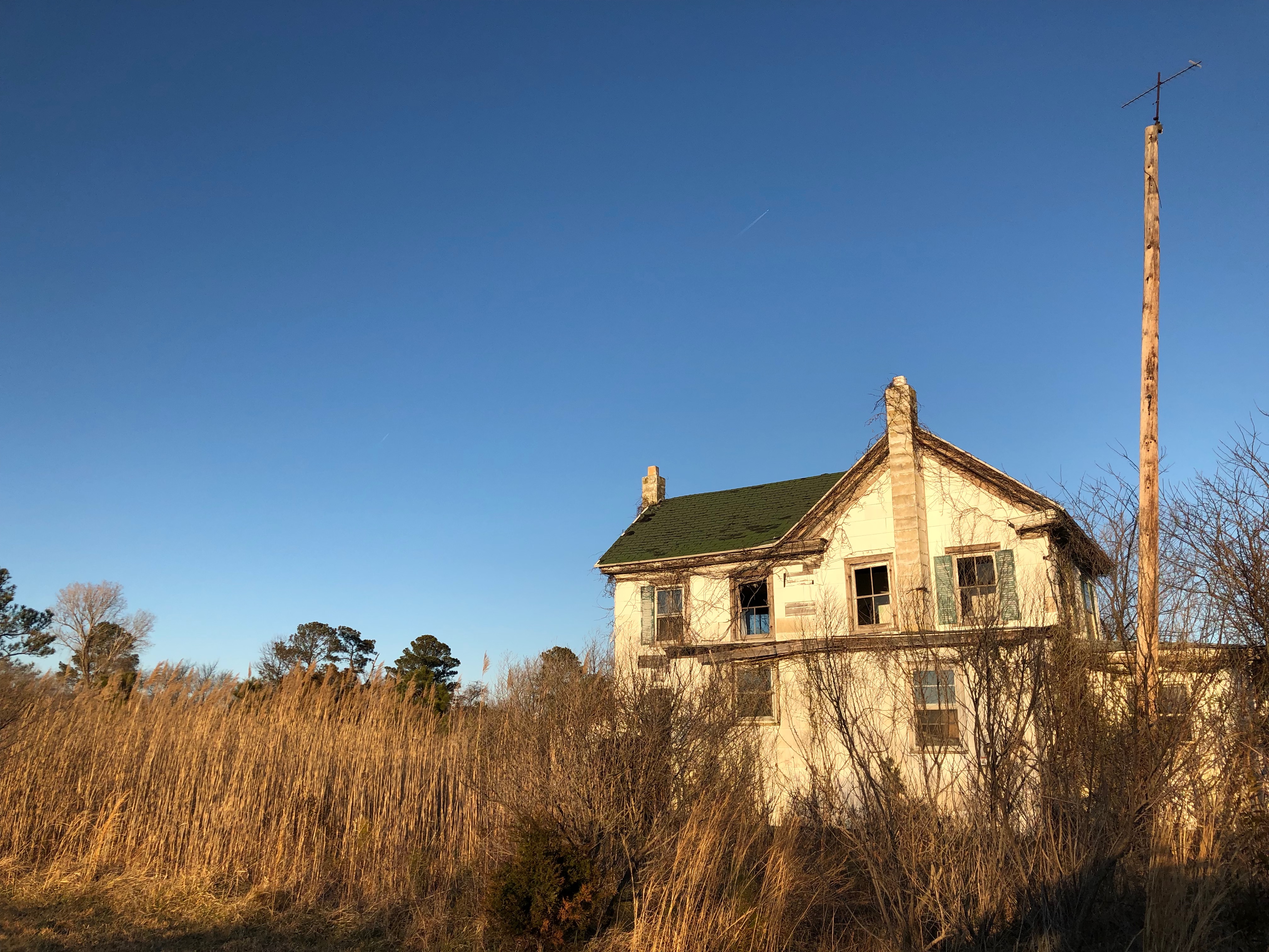 Sea level rise and how to prepare for it is one area in which collaborative learning among scientists, residents and government officials. This house on Deal Island has already succumbed to the coming changes.