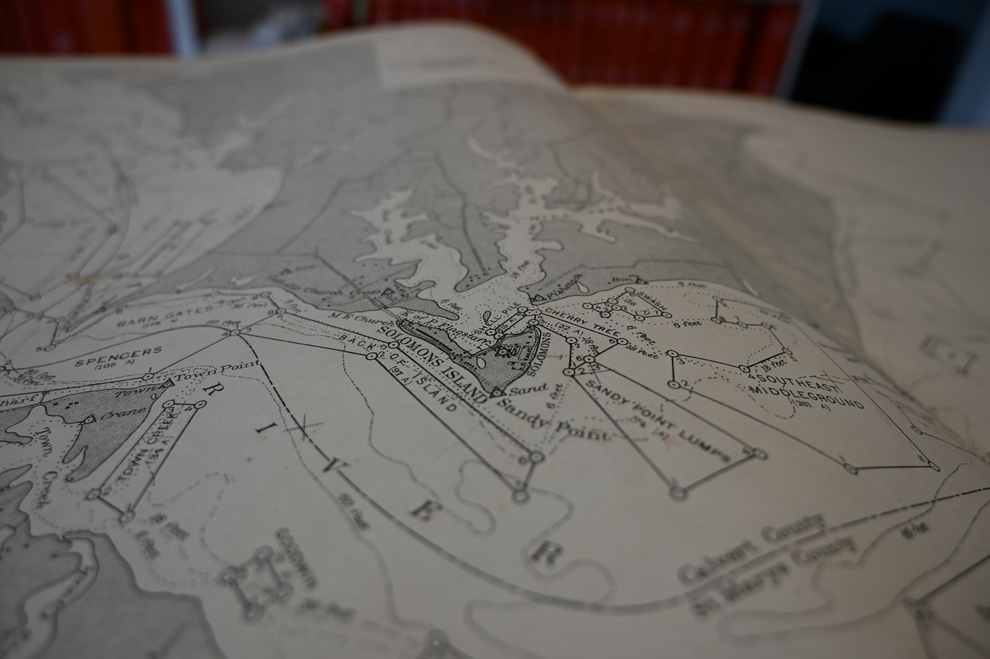 An interior page from a book of charts, showing the oyster bars surrounding Solomons Island 