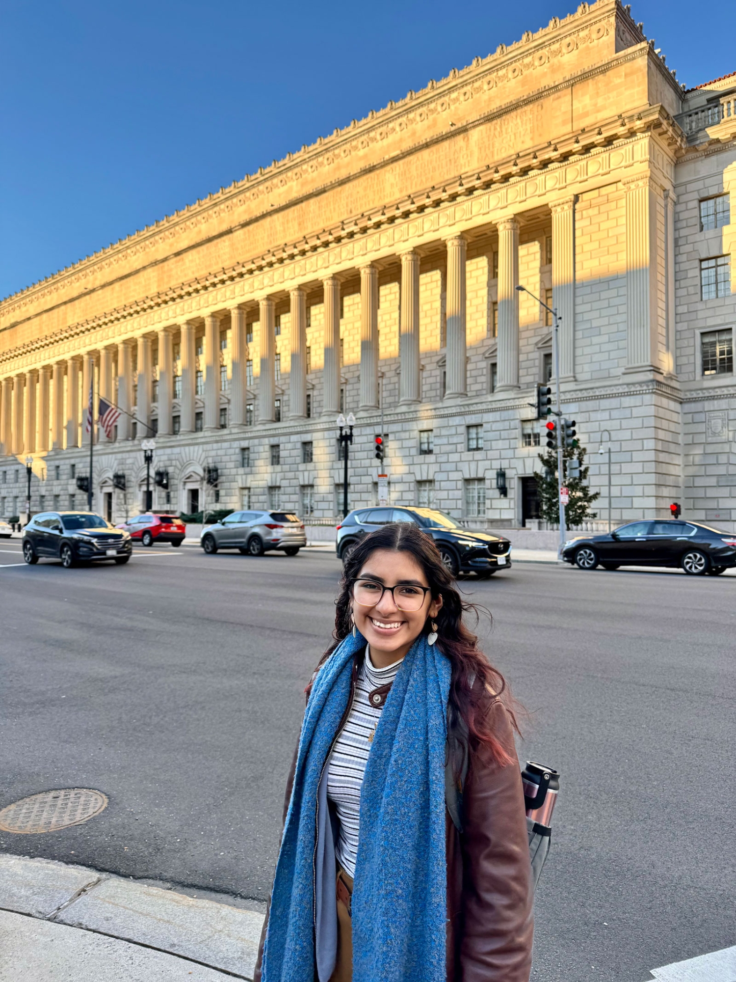 Portrait of Jessica Diaz in front of a government building in the US Capitol