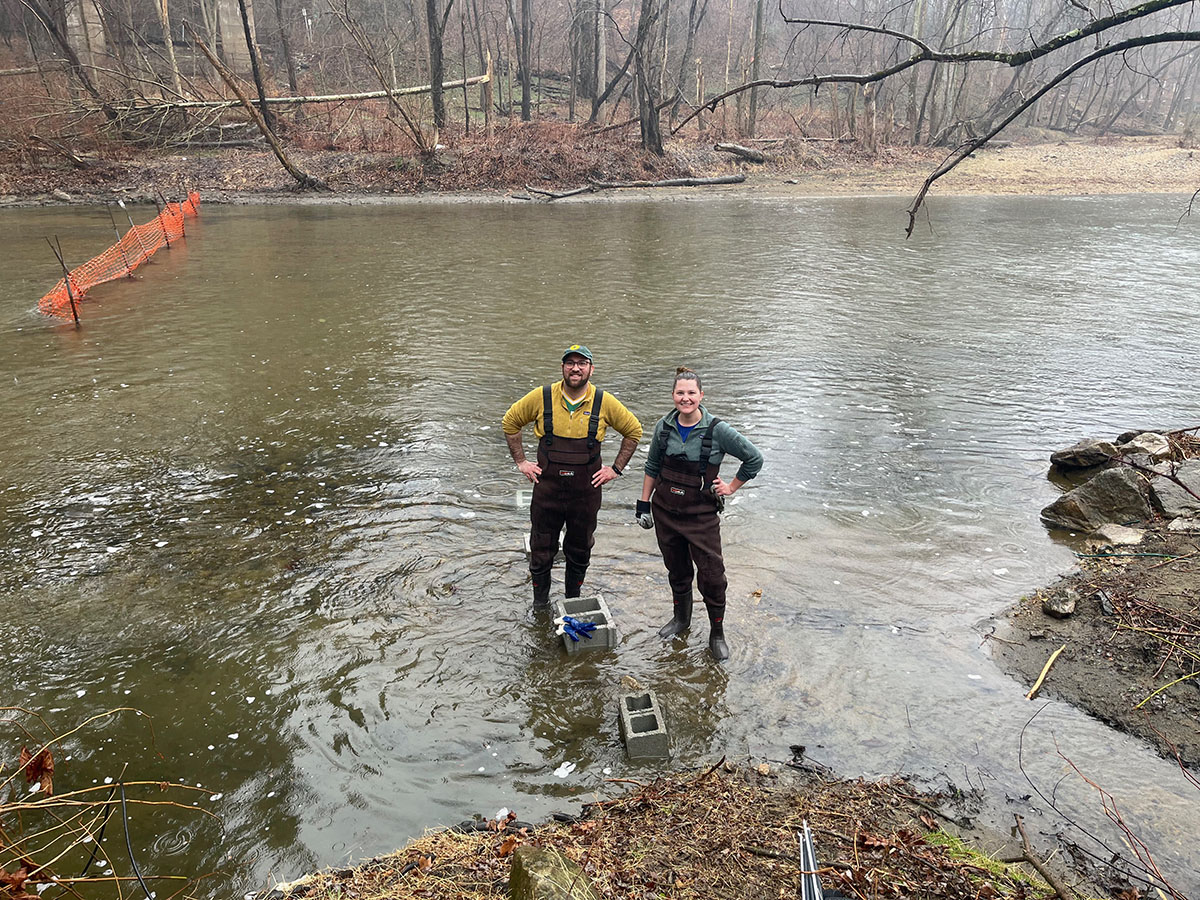 Launching an autosampler on the Patapsco River to track river herring, American shad and hickory shad. Credit: Photo courtesy of Chelsea Fowler