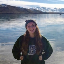 Photo of Samantha Gleich standing in front of water.