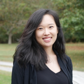 Carol Kim in front of trees