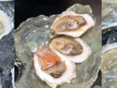 Finished oyster mignonette dish on a glass plate