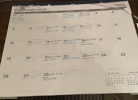 A desk calendar labelled with assignment deadlines.