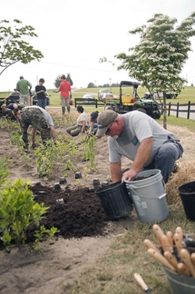 cecil county watershed steward academy participants install a rain garden near Fair Hills Maryland to soak of stormwater runoff 
