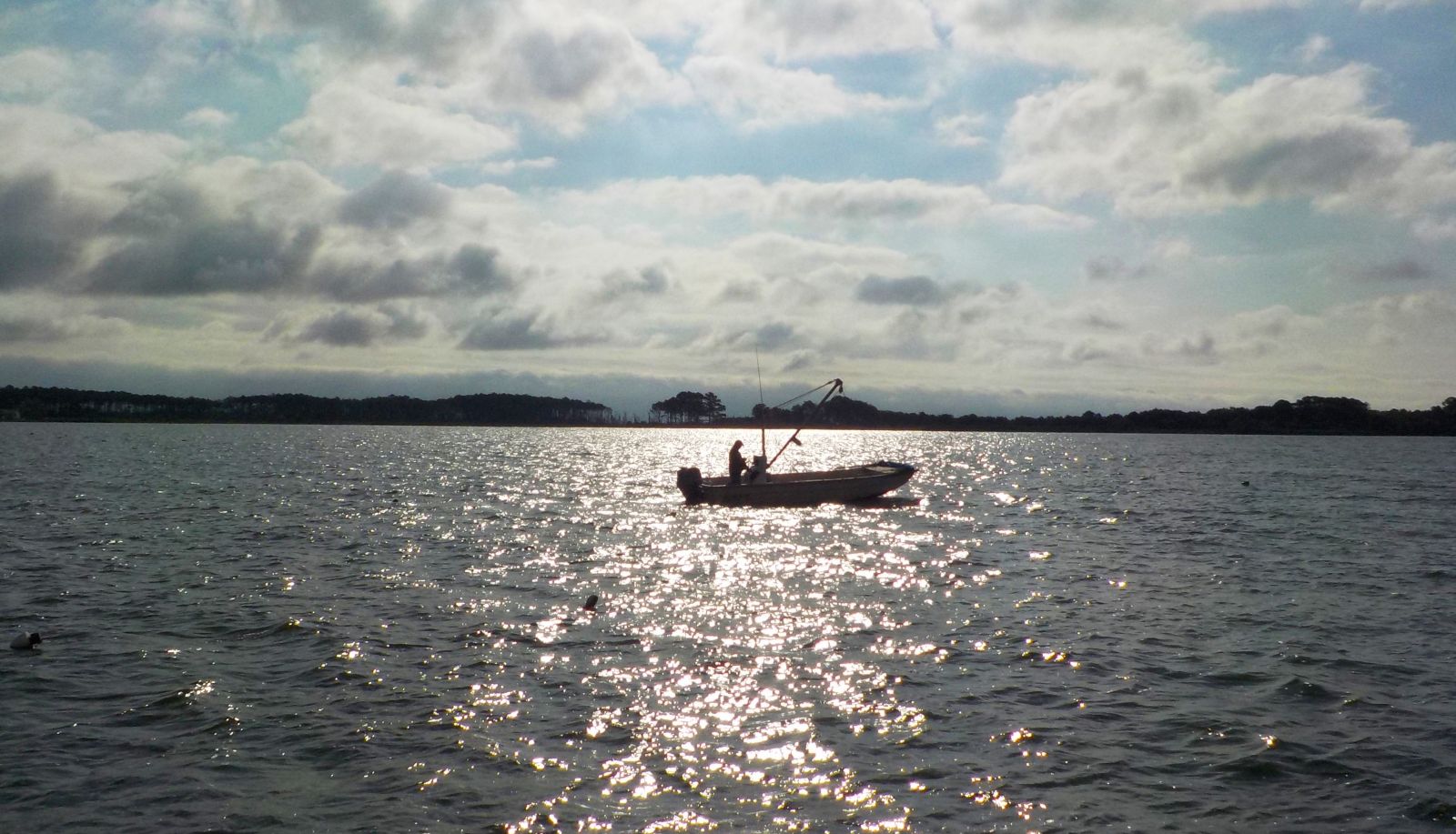 Waterman in his boat